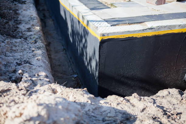 Professional Waterproofing technician working in Clarks Hill, IN